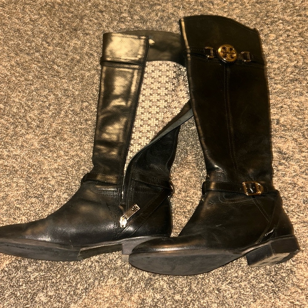 Timeless black leather Tory Burch riding boots with gold details